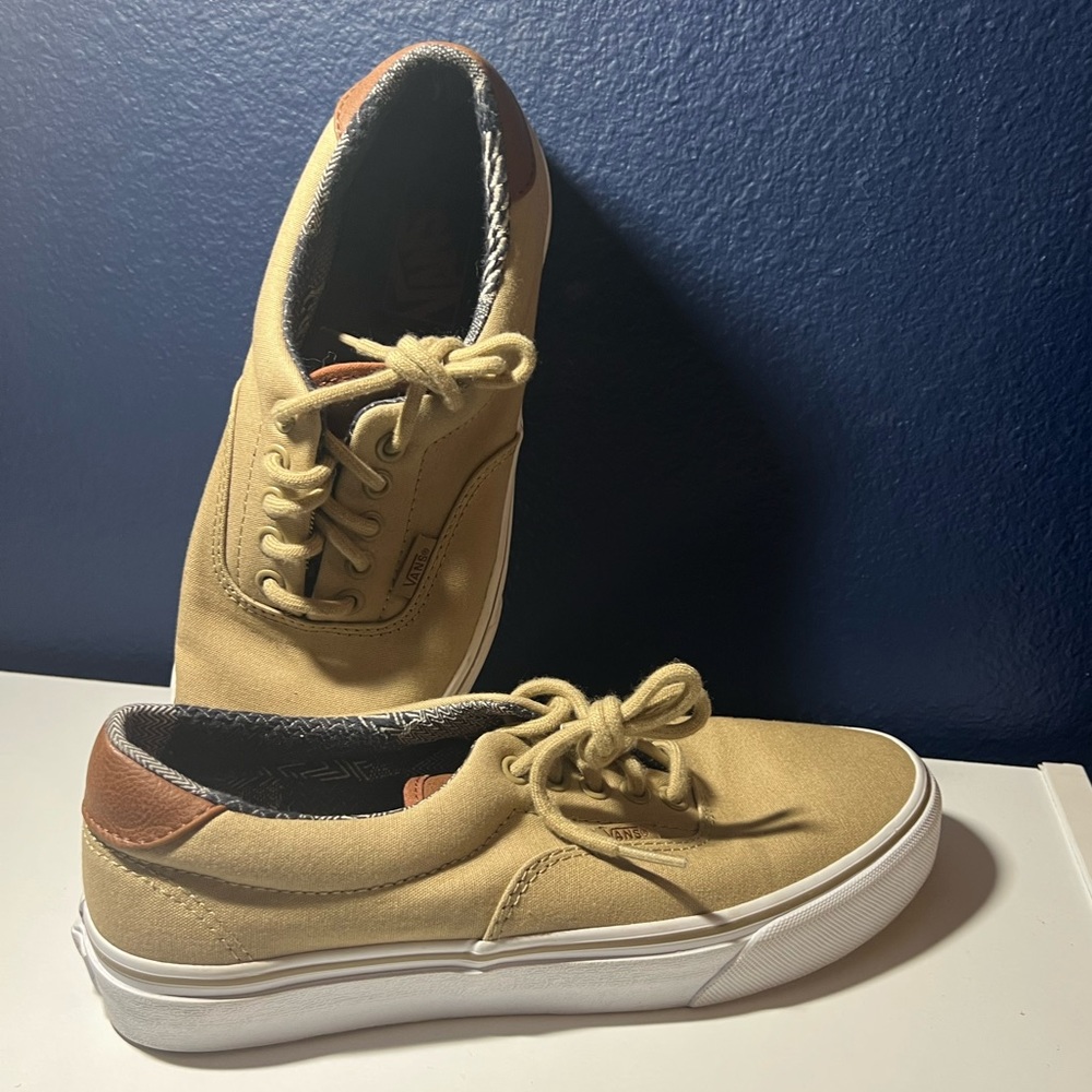 Tan Vans shoes.
